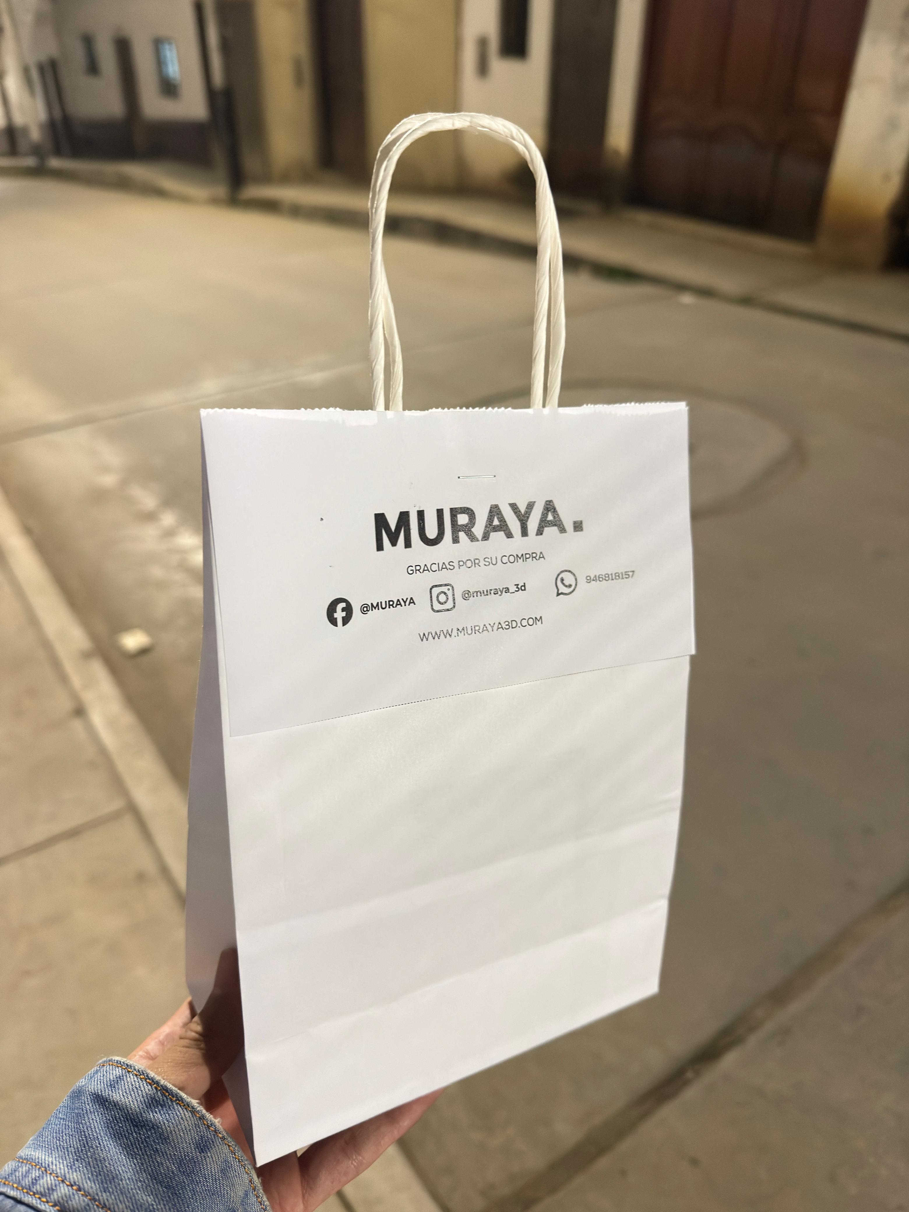 Entrega real de un pedido MURAYA en bolsa blanca